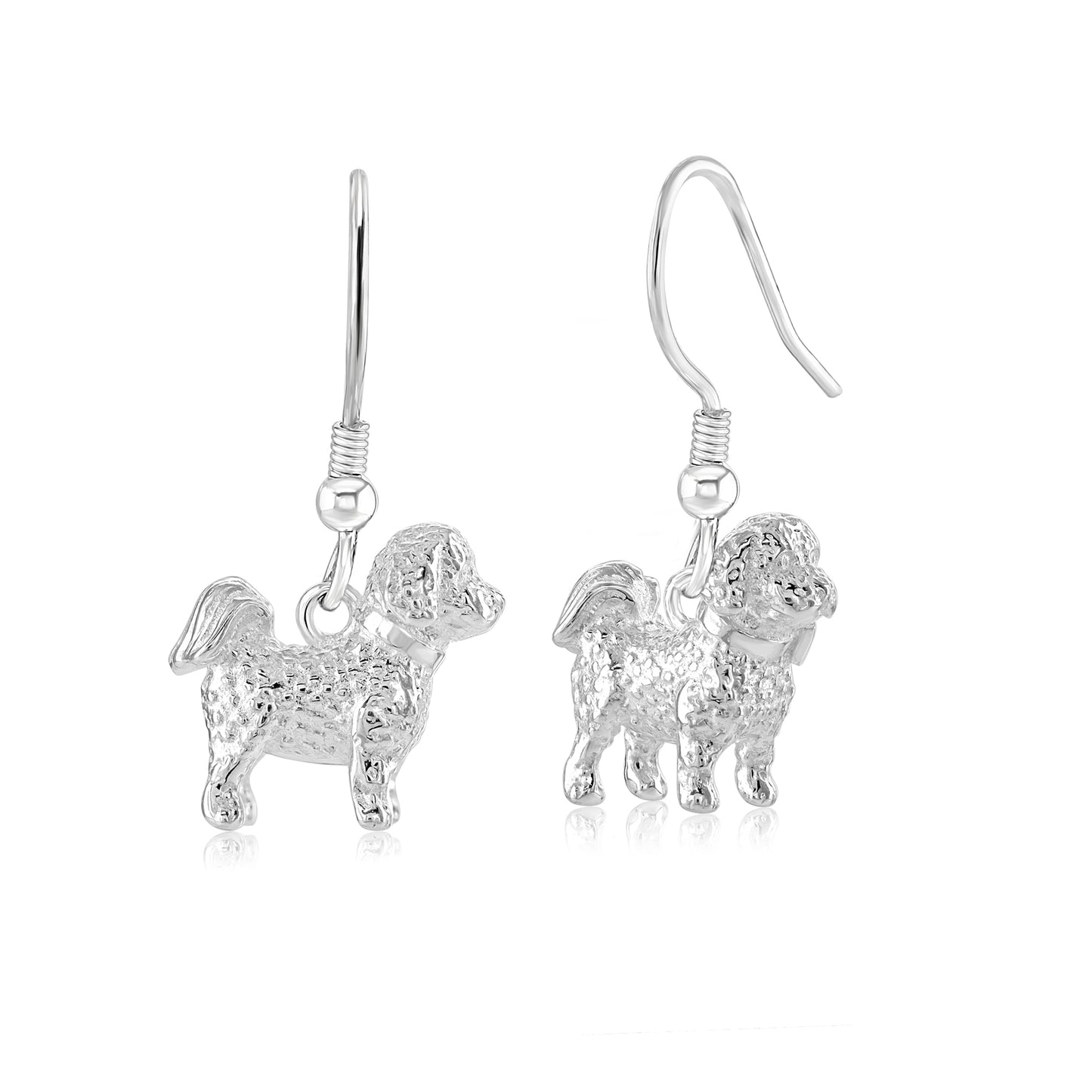 A pair of sterling silver hoop earrings with a Bichon Frise dog charm attached to them, displayed against a white background.